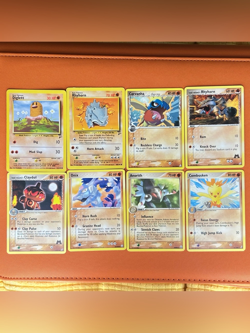 Pokemon Card Lot with Yellow, Brown, Blue, Orange Accents